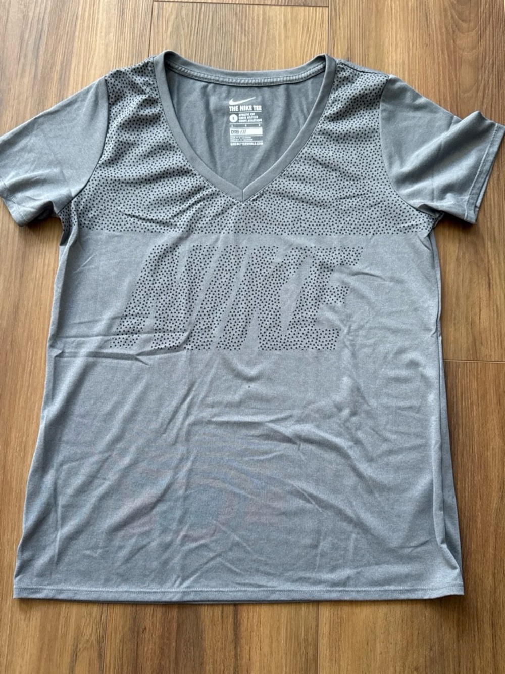 Nike women's Gray Perforated V-Neck Athletic Tee